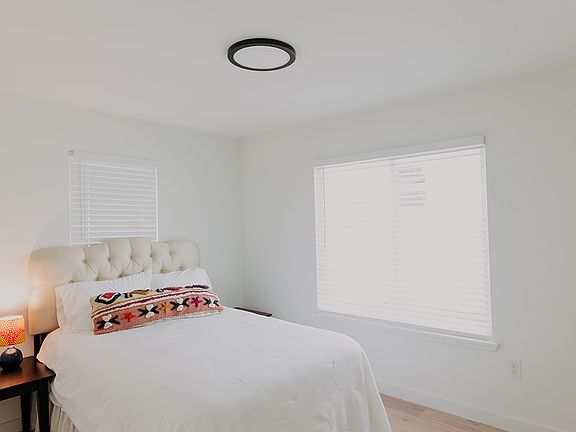 Bedroom 3 facing driveway. includes large walk-in closet.