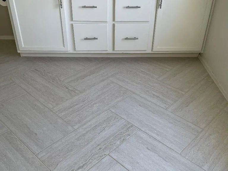 Master Bath with herringbone porcelain tile