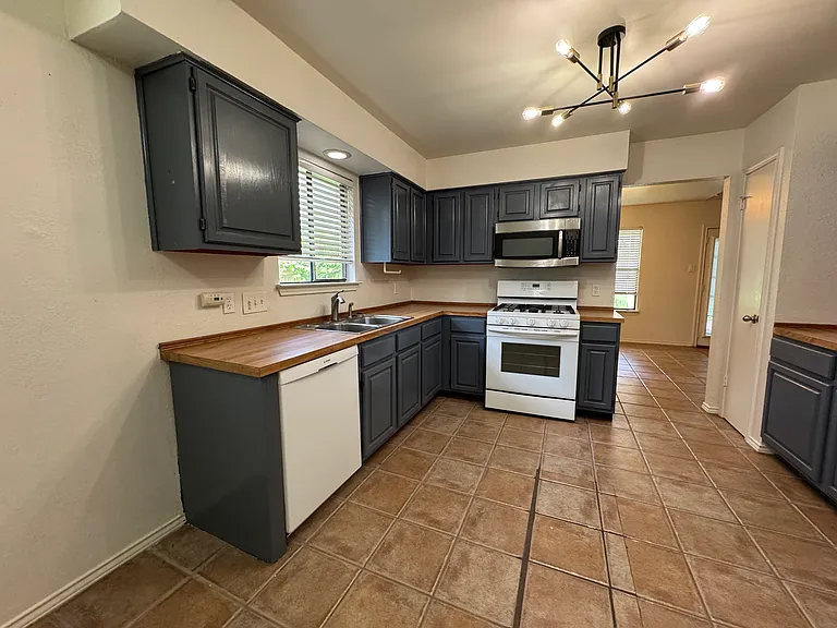 Kitchen - view from breakfast area to dining room