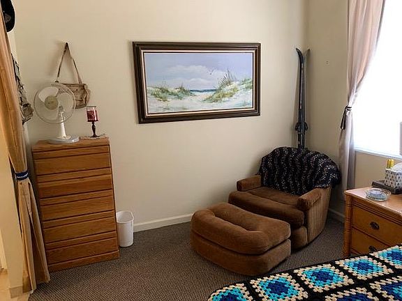 Bedroom will hold queen or king bed and has walk in closet.