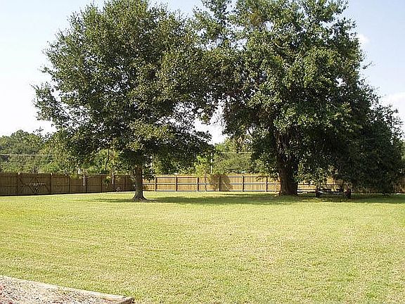 Fenced backyard, no backyard neighbors. Boat/RV parking allowed