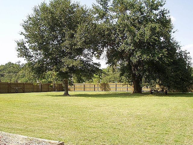Fenced backyard, no backyard neighbors. Boat/RV parking allowed