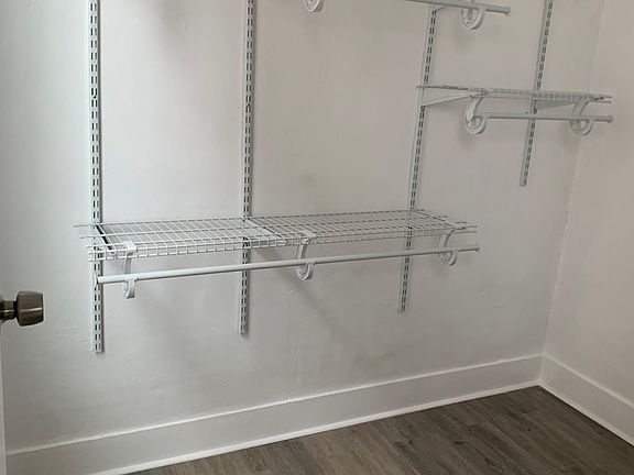 Walk in closet in master bedroom.
