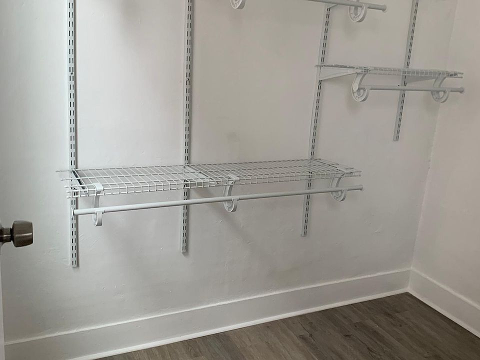 Walk in closet in master bedroom.