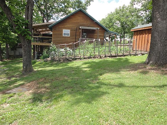 east side of house/small gdn