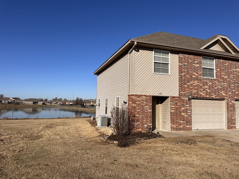 Exterior and one car garage.