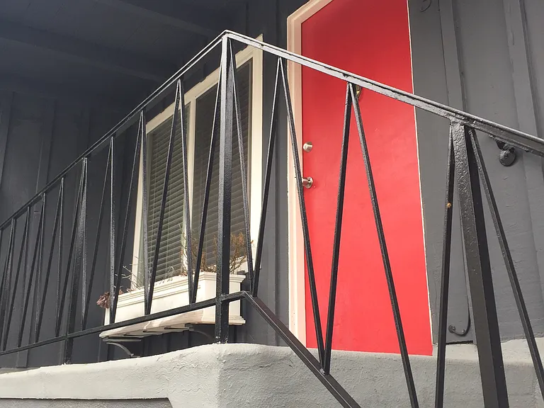 Top floor unit with landing space out front for a bike or chairs