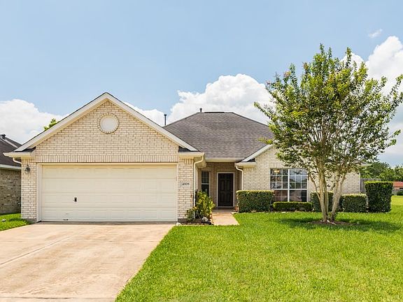 Corner lot, double driveway, and 2 car attached garage.