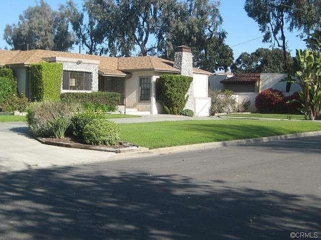 Front of the House with Circular Driveway