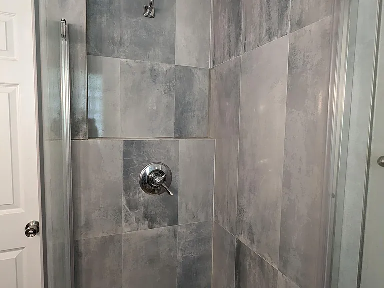 Full bath with separate shower on second floor