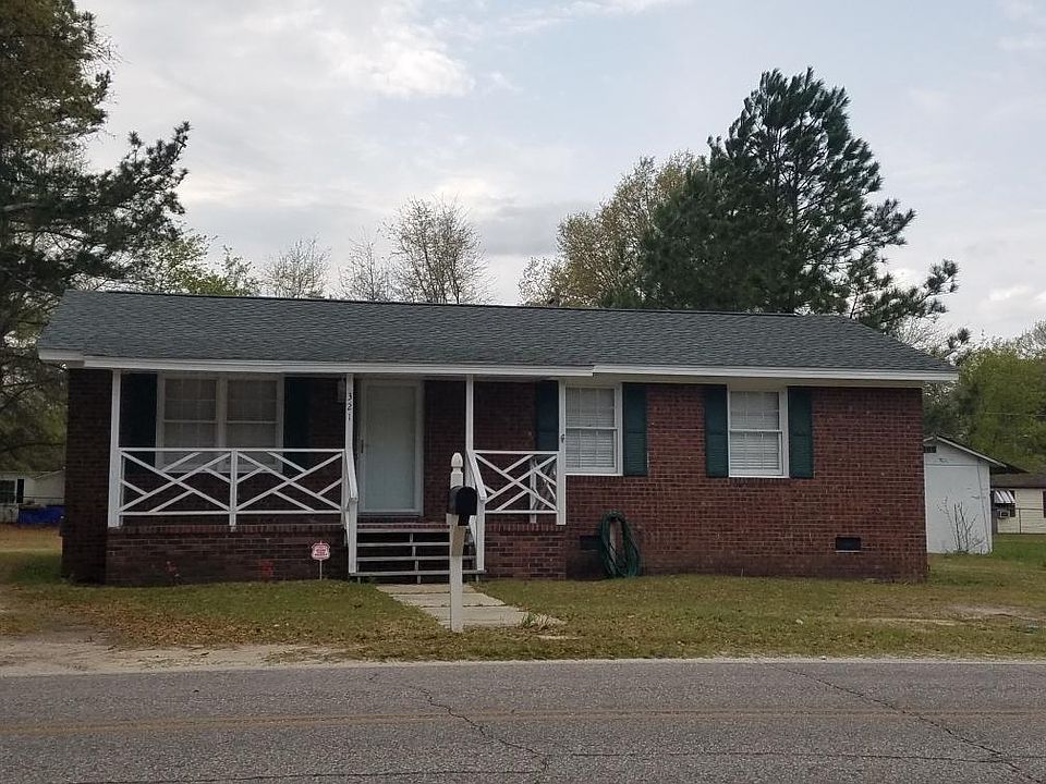 Front of the house shows new roof installed in 2016.