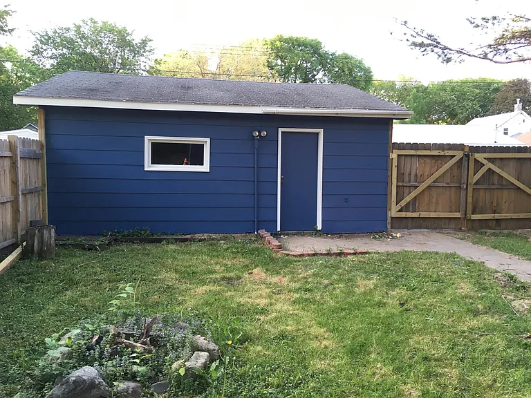 Backyard and detached garage.