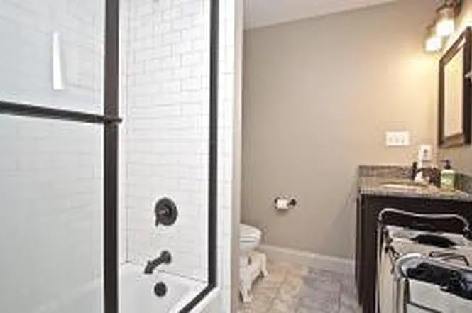 primary bedroom en suite bathroom