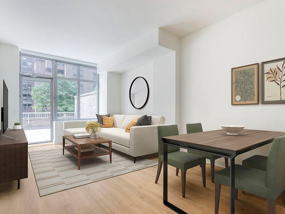 Renovated Package I living and dining area with hard surface flooring
