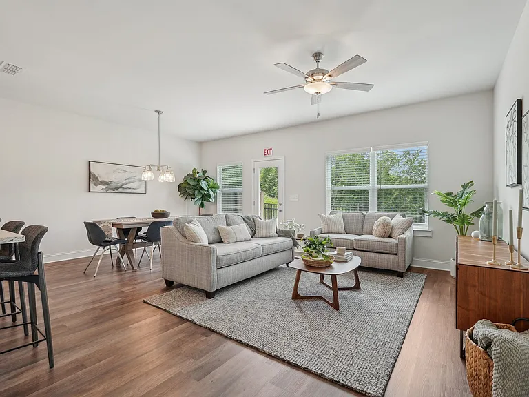 A refined living area offering a graceful view of the home's entryway.