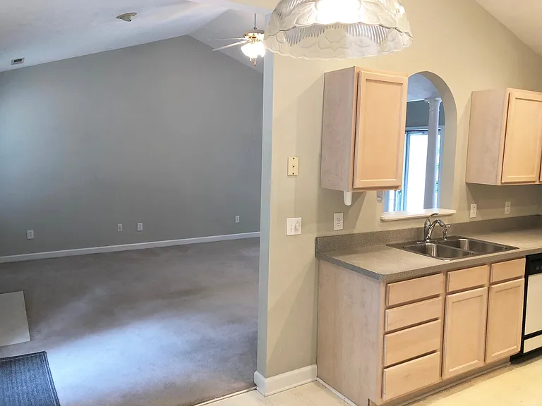 kitchen with living area in background