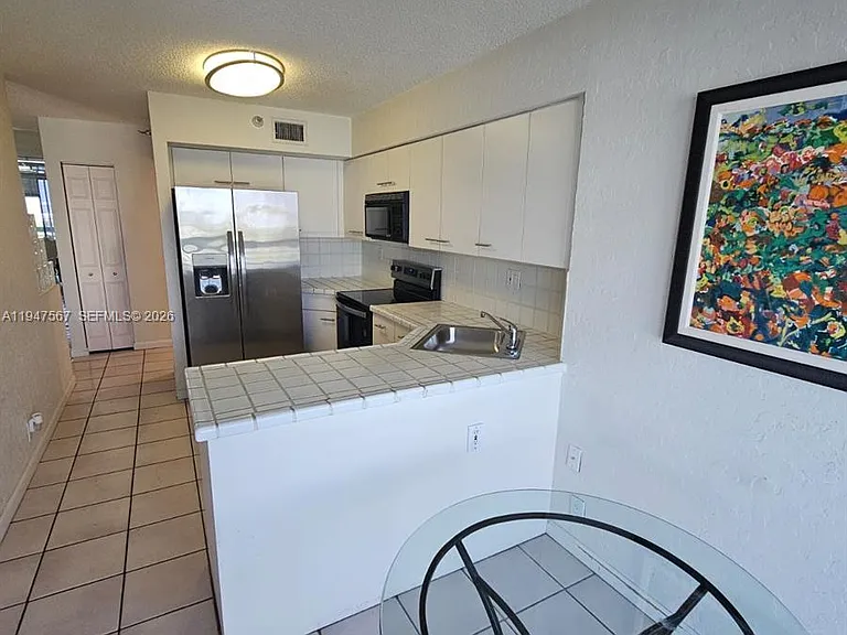 3530 Mystic Pointe Dr #1202 — Photo 6