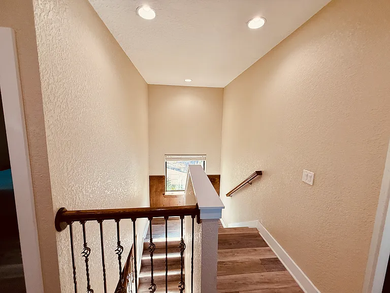 Laminate Flooring throughout second floor and Stairs