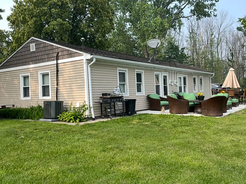 Large Back Patio with 0.5 acre lawn on your side