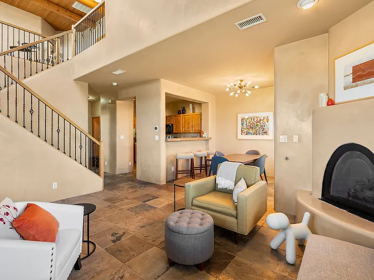 Living Area / Kiva Fireplace / Kitchen / Dining