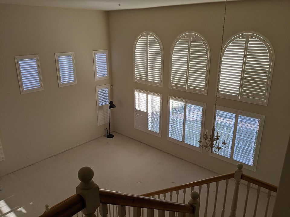 High ceiling living room view from 2nd floor.