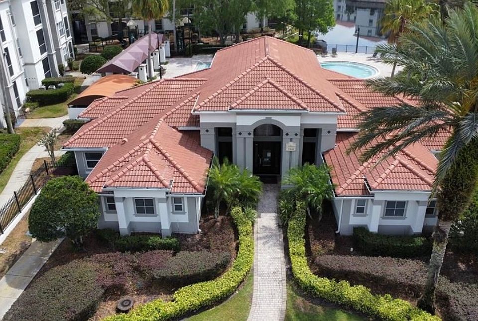Clubhouse of Bella Terra_.. building of our apartment is directly to the right of the clubhouse and pool area_.wonderful location in the complex for use of facilities, beautiful views and easy access in and out of front gates_.