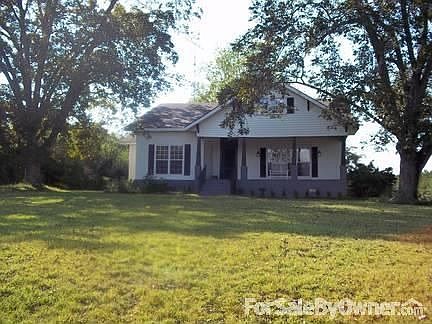 Large porch at the front of the house
						:
						East facing windows catch the morning sun
