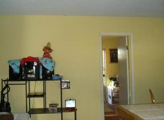 VIEW OF INTERIOR/LIVING ROOM AREA