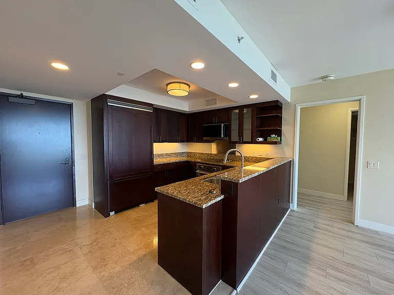 Entry door and kitchen