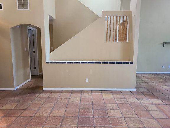 Stairway to go up. 
Main floor: Tiles in all rooms