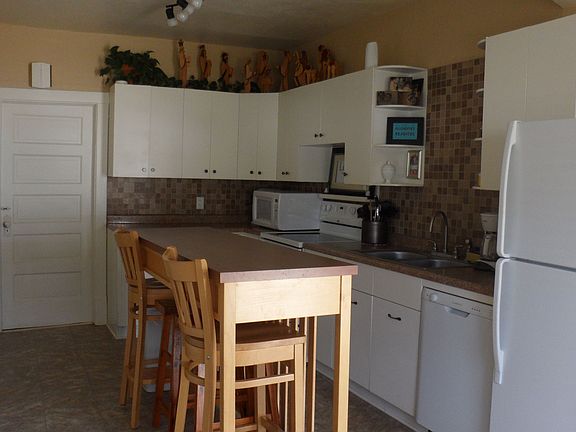 Kitchen with dishwasher. All appliances to stay