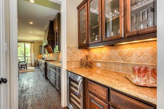 You will love the Butler's Pantry with built-in wine refrigerator. 