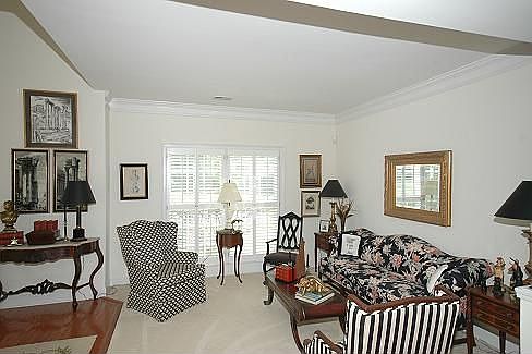All the "extras" like crown molding, rounded archways, columns make this home 