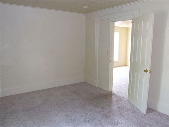front bedroom has the green carpet in it now as well