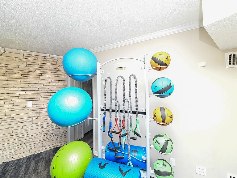 Elevate your fitness routine with this well-equipped home gym corner.
