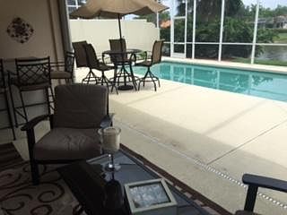 Outdoor pool are with bar