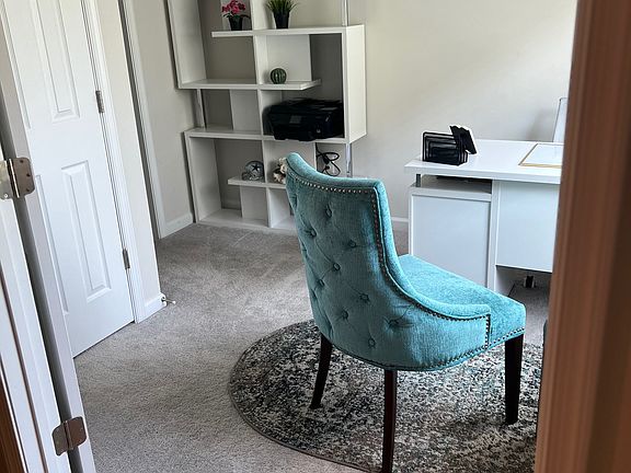 Bedroom or office space, with attached bathroom.