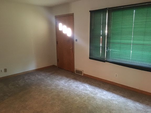 Living room and front door.