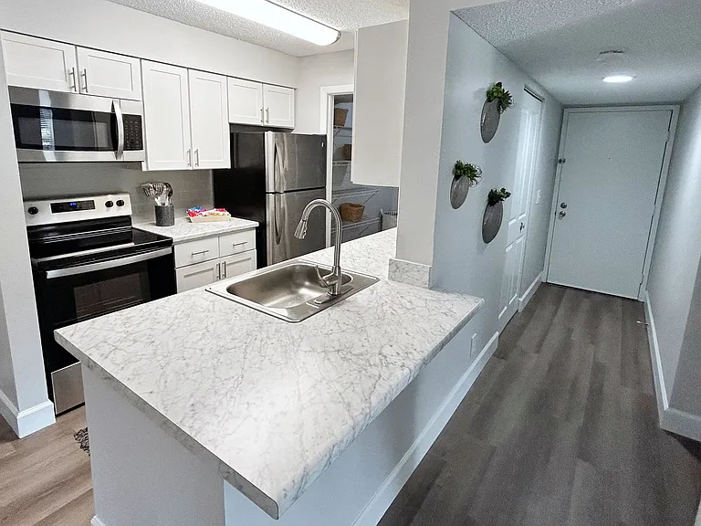 Our open concept kitchens allow for easy entertaining.