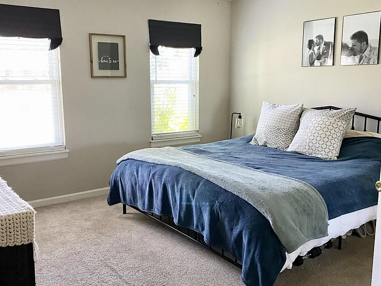 Large master bedroom w/ walk-in closet.