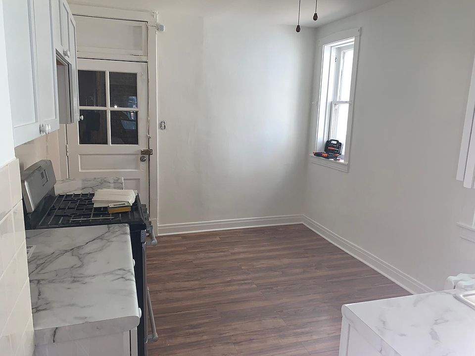 just renovated kitchen with 2 yr old stove. Cabinets, sink, and flooring is all new. Fridge will also be brand new.
