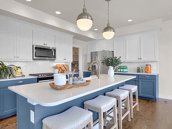 Spacious kitchen. Photo representing home to be built and may demonstrate optional features