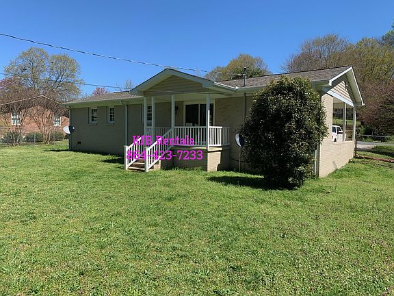 Large backyard with covered porch