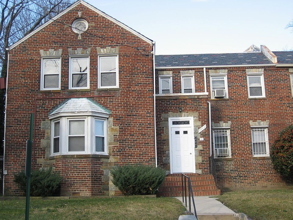 The vacant unit is the one on the left on the first floor. It has a bay windows