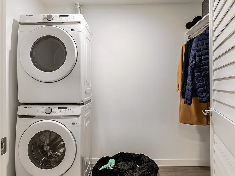 Mudroom with full-size washer and dryer