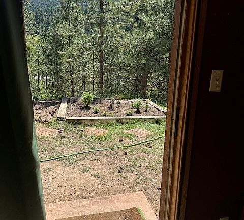 Looking out to raised bed garden