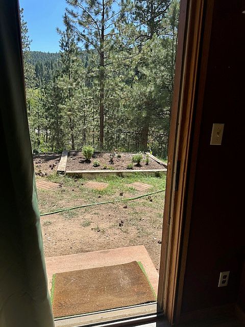 Looking out to raised bed garden