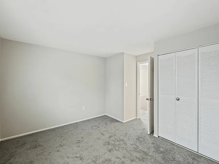 Step into tranquility with this spacious and inviting bedroom layout.