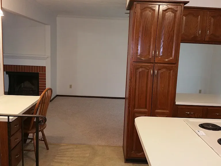 Looking into dining room through kitchen