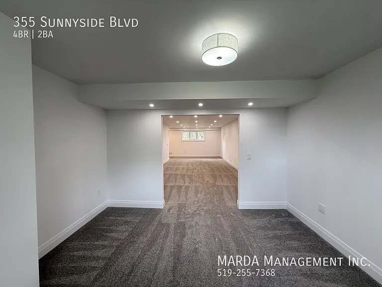 355 Sunnyside Blvd — Photo 48